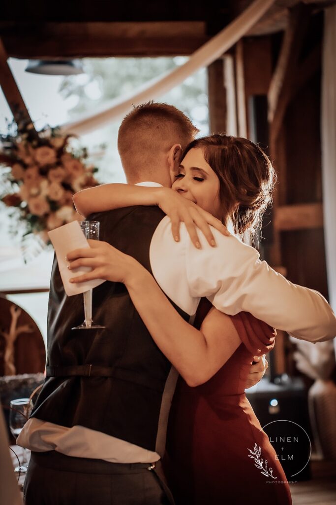 Siblings Hugging After Wedding Speech Cedar Bay Farm