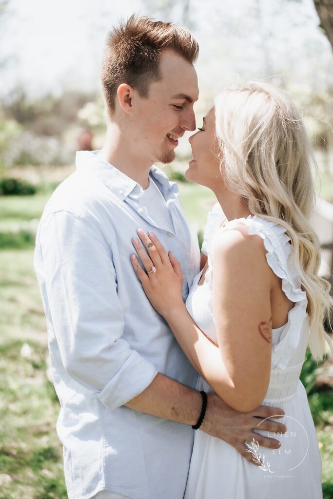Couple hugging Romantic daffodil filed Cincinnati Dayton Engagement Photography |