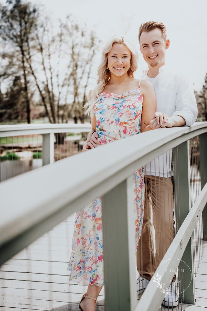 Couple on bridge engagement photography Cox Arboretum Dayton Ohio