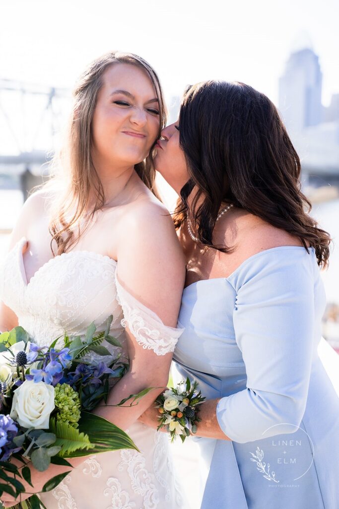 Mom Kissing Daughter On Cheek Cincinnati Lbgtq Wedding Photography