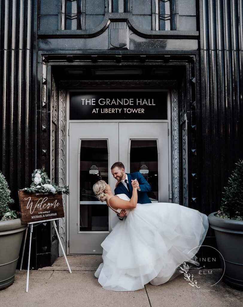 Groom Dipping Bride At The Grande Hall Dayton Wedding Photographer