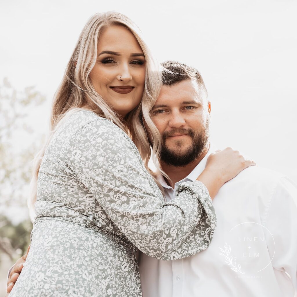 Posed image of beautiful engaged couple in Ohio park, Bright Rustic Engagement Session Dayton Ohio