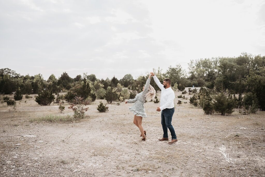 Couple slow dancing in an Ohio park during engagement session, Bright Rustic Engagement Session Dayton Ohio