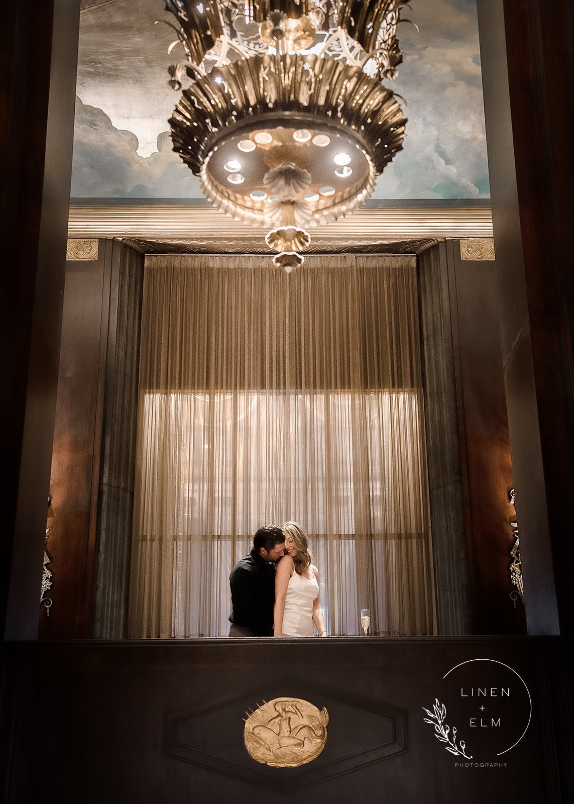 Engagement photography couple on balcony at Hilton Netherland Plaza Cincinnati